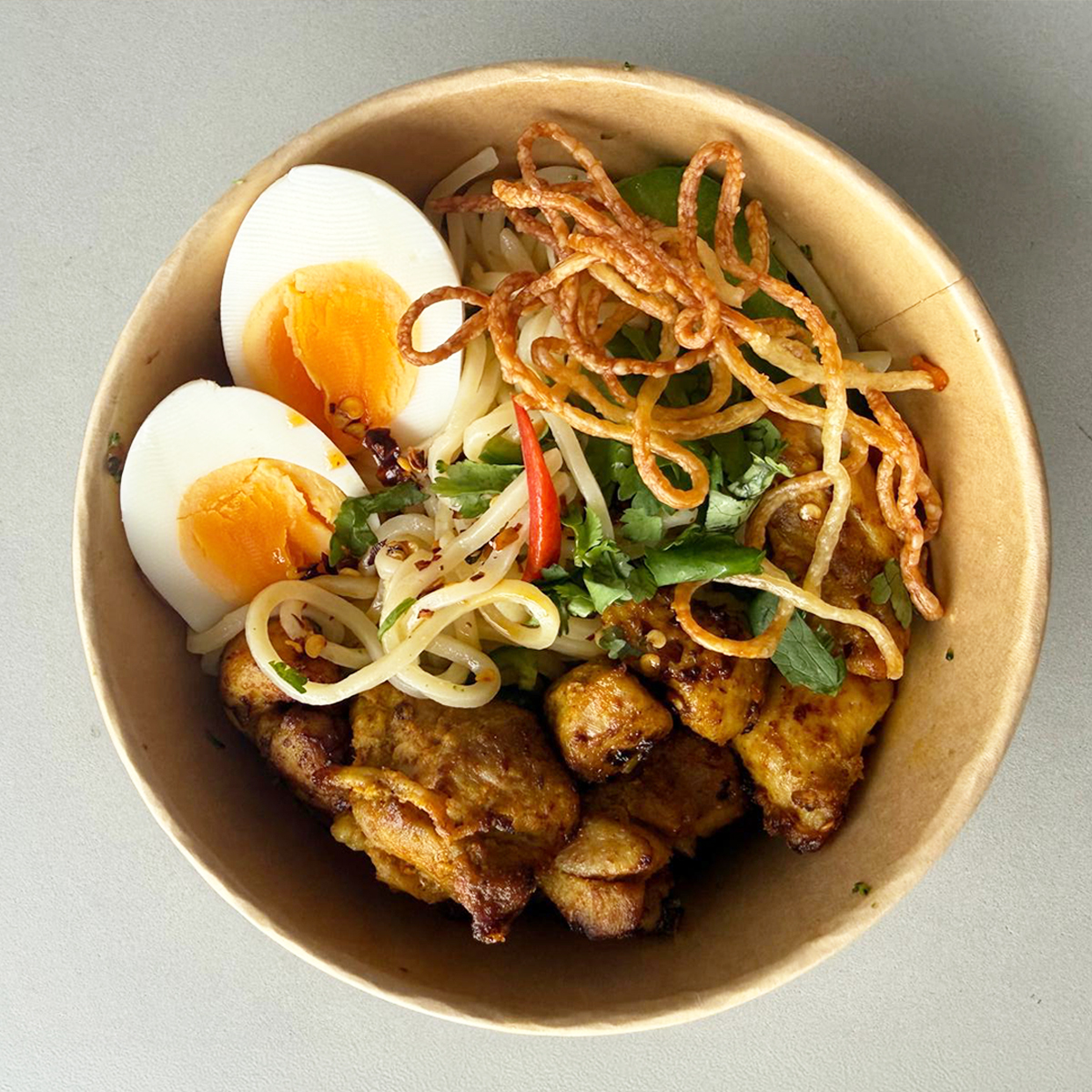 Burmese Khao Suey being served