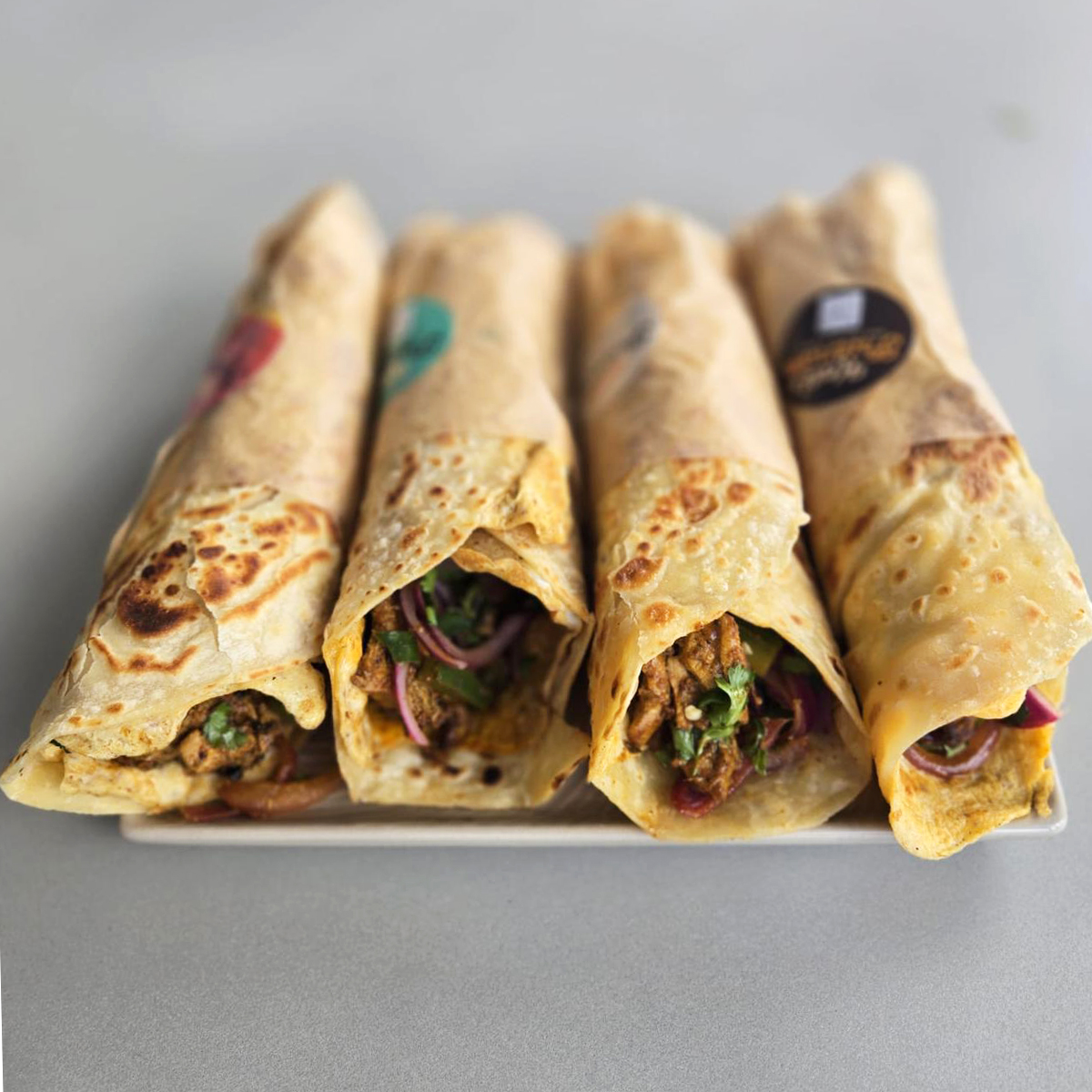 Kati rolls on a grey background